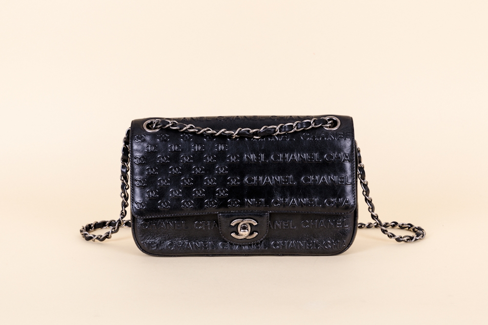 Chanel Symbol Embossed Classic Flap Bag